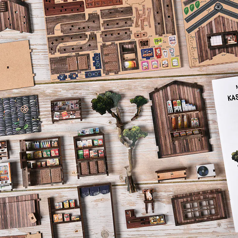 Spring Day Book Nook DIY Bausatz mit Holzbauteilen, Miniaturmöbeln, Pflanzen und detaillierten Zubehörteilen zur Montage