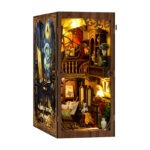Art Book Nook mit Miniatur-Malatelier, Staffelei, Gemälden und warmer LED-Beleuchtung