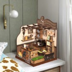 Kleines Café Book Nook als Bücherregal-Dekoration für Zuhause mit warmem Miniaturdesign