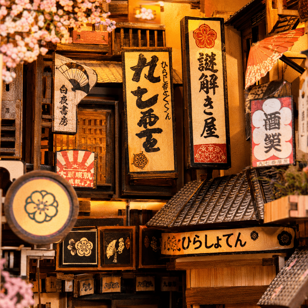 Japanese Cat Alley Book Nook Miniatur mit mehreren japanischen Straßenschildern, Sakura-Details und warmer Gassenatmosphäre