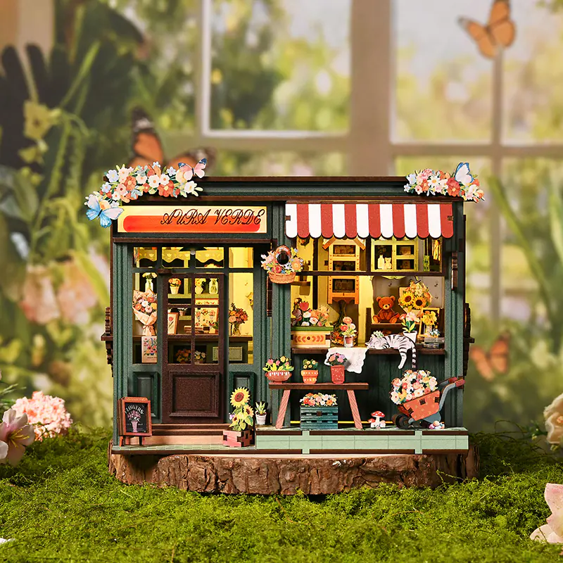 Flower House Book Nook als Miniatur-Blumenladen mit warmem LED-Licht, Blumen, Dekoration und gemütlicher Gartenszene