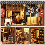 Japanischer Izakaya Book Nook mit Miniatur-Theke, Katzenfigur, Getränken und liebevollen Details