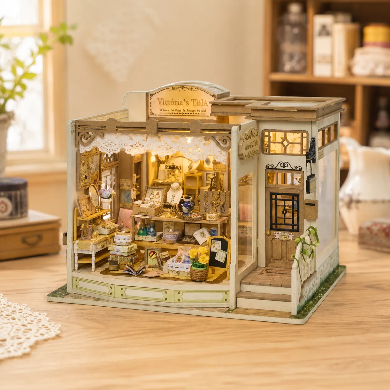 Eingerichtetes Miniatur-Puppenhaus mit Schlafzimmer, Küche, Wohnbereich und kleinen Möbeln